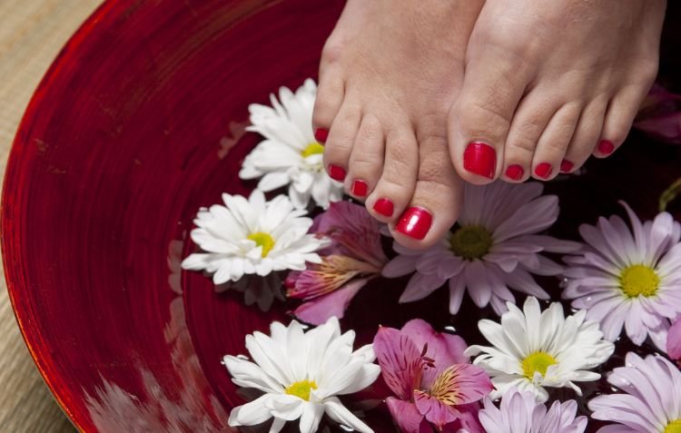 How Long Does a Pedicure Take? Spa pedicure with floral soak.